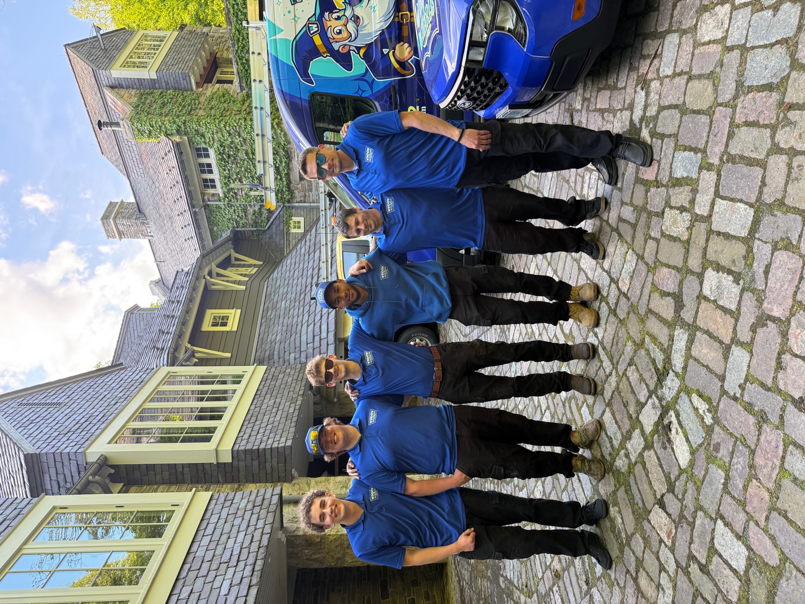 Window Wizards team giving thumbs up